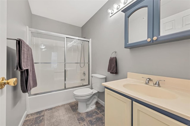 14 Eagle Rock Cv Unit 307, Valley Park, MO 63088 - bathroom featuring baseboards, toilet, shower / bath combination with glass door, and vanity