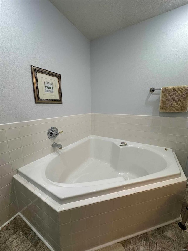 bathroom featuring a bath