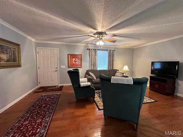 501 Forrest, Dexter, MO 63841 - living area featuring a ceiling fan, baseboards, ornamental molding, wood finished floors, and a textured ceiling