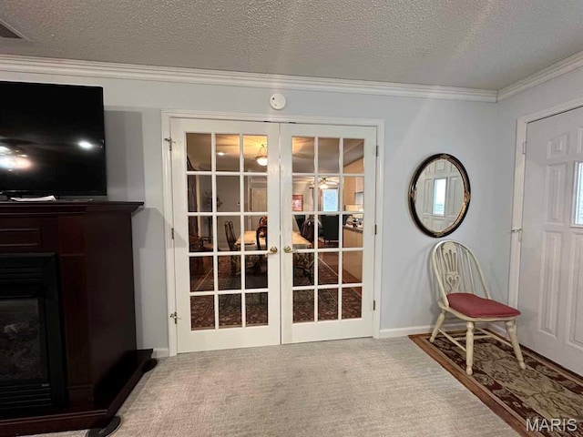 501 Forrest, Dexter, MO 63841 - doorway to outside with french doors, ornamental molding, carpet floors, a textured ceiling, and baseboards