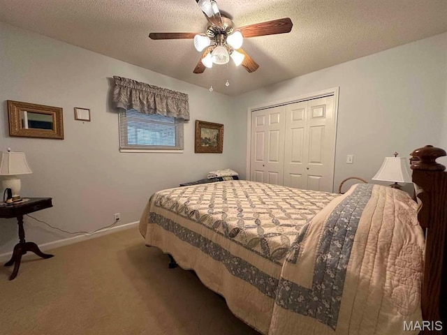 501 Forrest, Dexter, MO 63841 - carpeted bedroom with a closet, baseboards, ceiling fan, and a textured ceiling