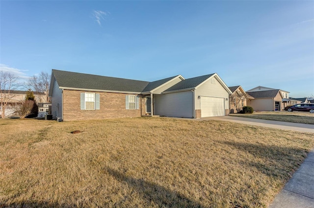 single story home featuring brick siding, an attached garage, concrete driveway, and a front lawn