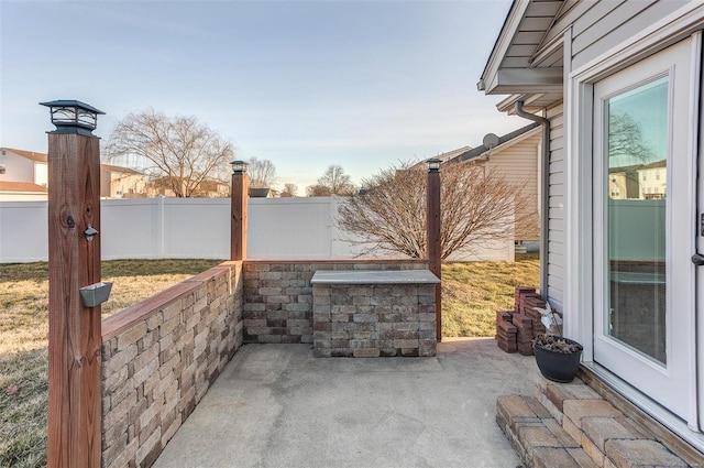 view of patio / terrace with fence