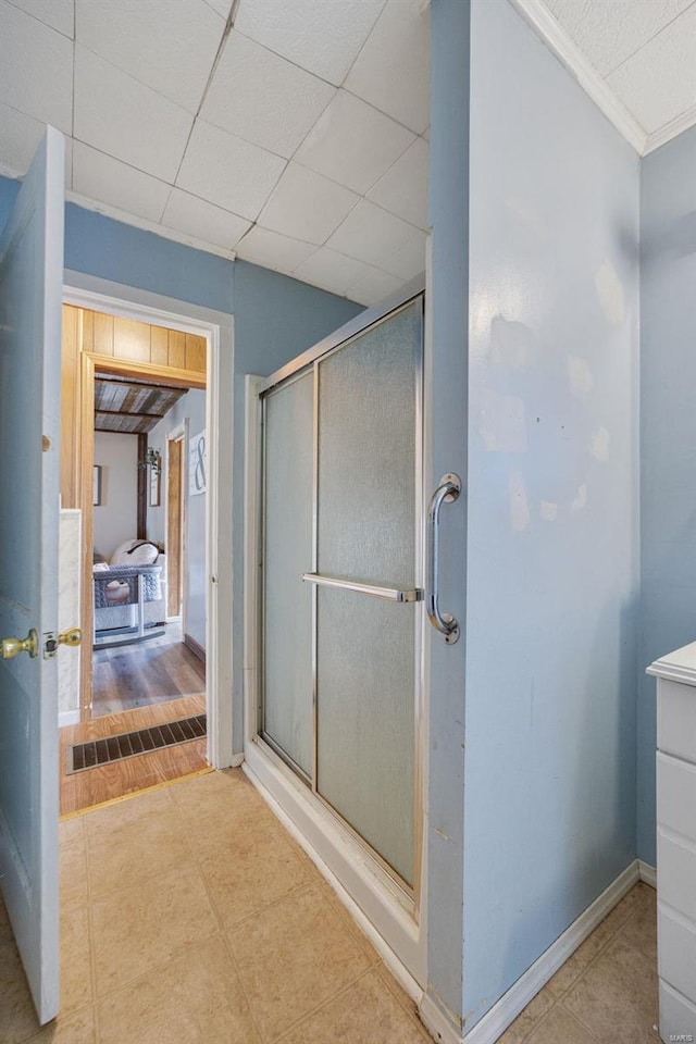 402 Virginia Ave, Potosi, MO 63664 - full bath featuring a stall shower, ornamental molding, and baseboards