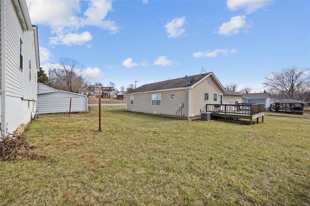 402 Virginia Ave, Potosi, MO 63664 - view of grassy yard with a deck and central AC
