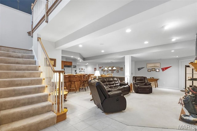 12537 Clark Manor Cir, Creve Coeur, MO 63141 - living area with bar, stairway, recessed lighting, and light carpet