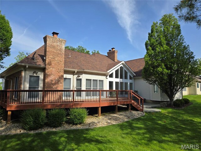 12537 Clark Manor Cir, Creve Coeur, MO 63141 - back of house with a wooden deck, a chimney, a lawn, and a shingled roof