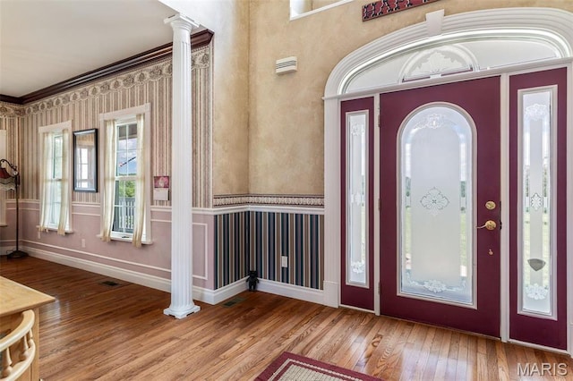 11400 State Road C, Hillsboro, MO 63050 - foyer featuring wood finished floors, crown molding, ornate columns, and baseboards