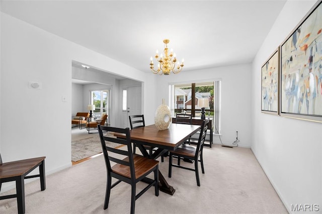 1214 Westrun Dr, Ballwin, MO 63021 - dining space featuring healthy amount of natural light, light carpet, and a chandelier