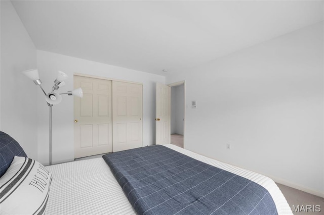 1214 Westrun Dr, Ballwin, MO 63021 - bedroom featuring carpet flooring and a closet
