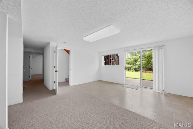 1214 Westrun Dr, Ballwin, MO 63021 - empty room featuring a textured ceiling
