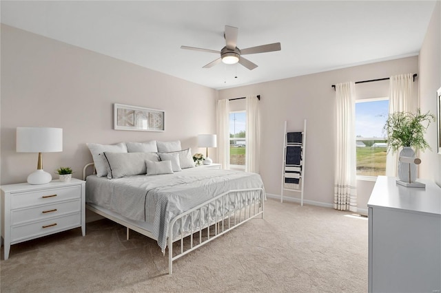 3248 River Breeze Ct, Saint Charles, MO 63301 - bedroom featuring light carpet, baseboards, and ceiling fan