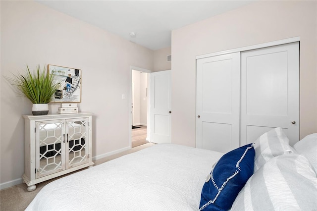3248 River Breeze Ct, Saint Charles, MO 63301 - carpeted bedroom featuring baseboards and a closet