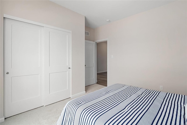 3248 River Breeze Ct, Saint Charles, MO 63301 - bedroom with a closet and light carpet