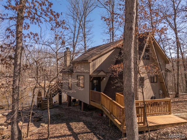 1758 Turrach Dr, Innsbrook, MO 63390 - back of property featuring a deck and a chimney