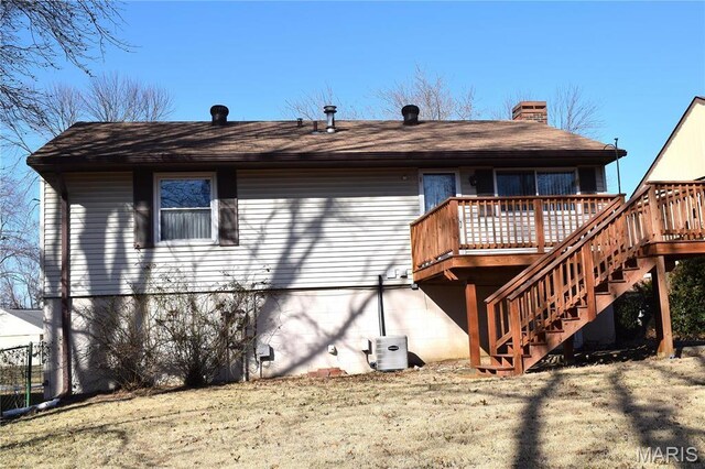 50 Arabelle Dr, Belleville, IL 62220 - rear view of house with a wooden deck, stairs, a chimney, and ac unit