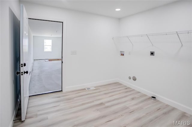1002 Brianna Ct, Jerseyville, IL 62052 - laundry area with hookup for a washing machine, hookup for an electric dryer, light wood-type flooring, and recessed lighting