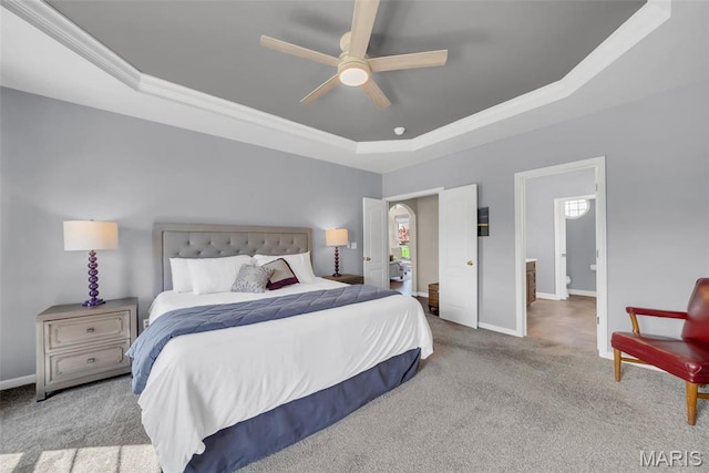 1101 Panda Ct, Wentzville, MO 63385 - carpeted bedroom featuring a raised ceiling, baseboards, crown molding, and a ceiling fan