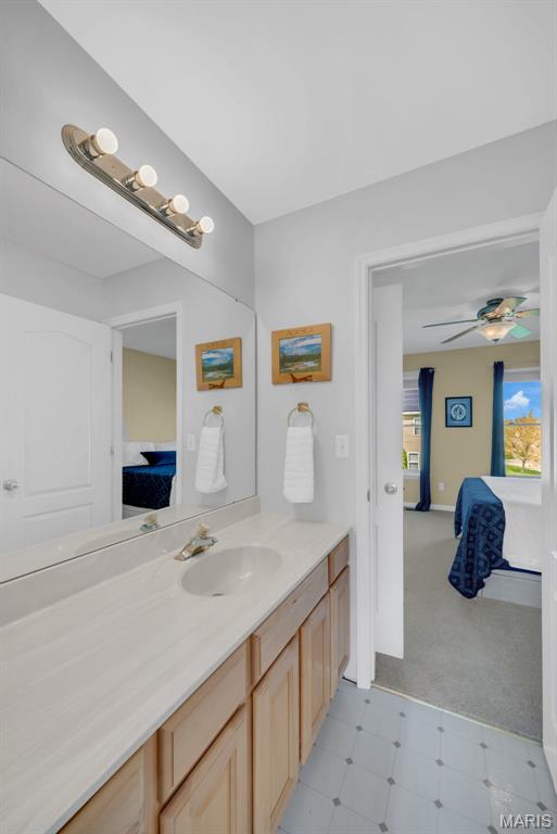 1101 Panda Ct, Wentzville, MO 63385 - bathroom with vanity and ceiling fan