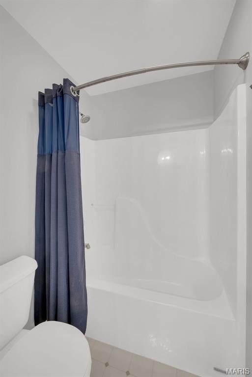1101 Panda Ct, Wentzville, MO 63385 - full bath with toilet, shower / bath combo, and tile patterned floors