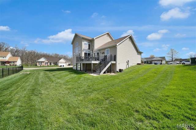 1101 Panda Ct, Wentzville, MO 63385 - back of house featuring a wooden deck and stairway