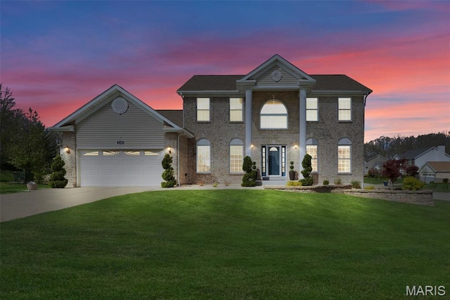 1101 Panda Ct, Wentzville, MO 63385 - greek revival inspired property with concrete driveway, a front lawn, and a garage