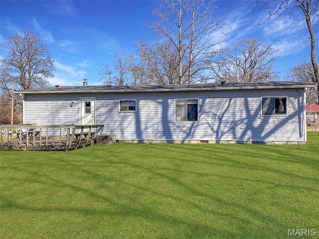 307 Silvey, Fayette, MO 65248 - rear view of property featuring a yard and a deck
