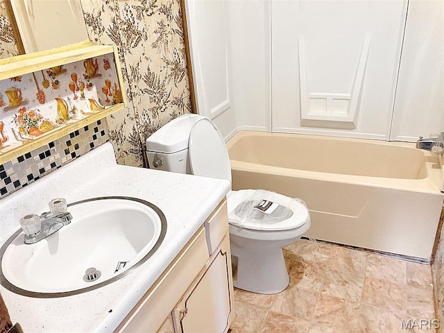 307 Silvey, Fayette, MO 65248 - bathroom featuring vanity, tub / shower combination, and wallpapered walls