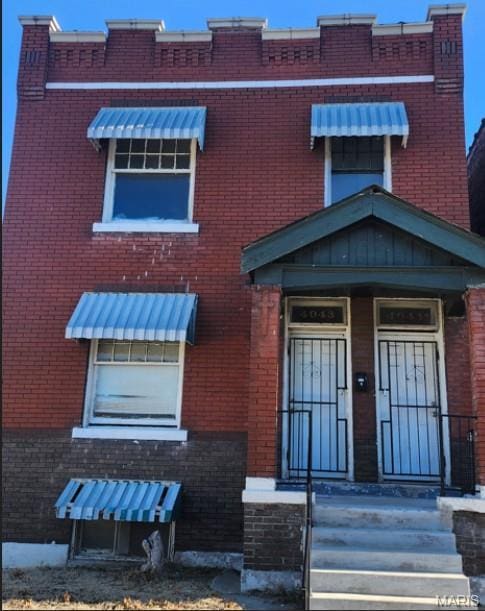 4043 Palm St, Saint Louis, MO 63107 - view of front of house with brick siding