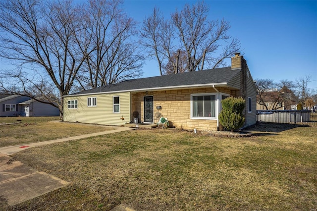 ranch-style house with a chimney and stone siding