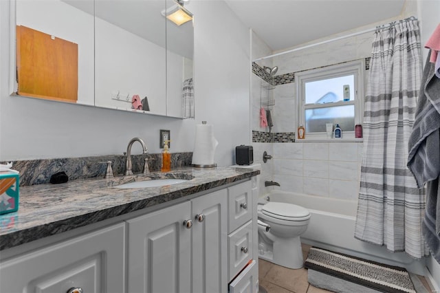 full bath with vanity, shower / bath combination with curtain, toilet, and tile patterned flooring