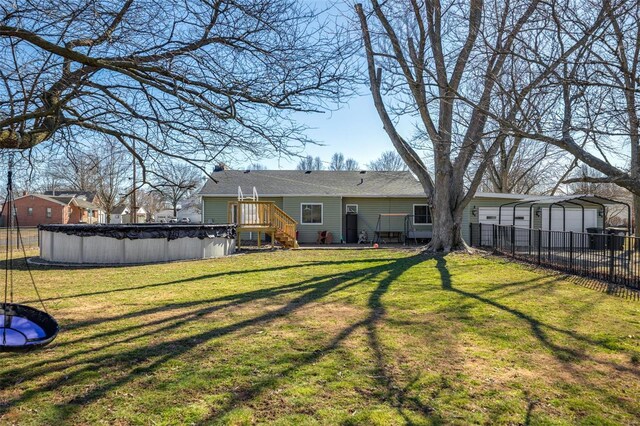 back of property featuring a deck