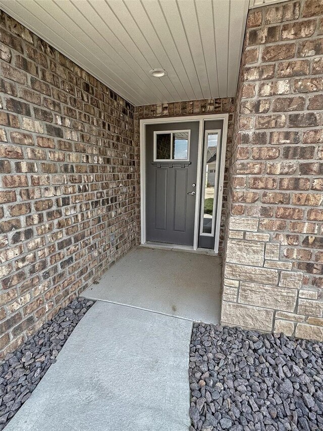 624 Rhapsody, Troy, IL 62294 - property entrance featuring brick siding