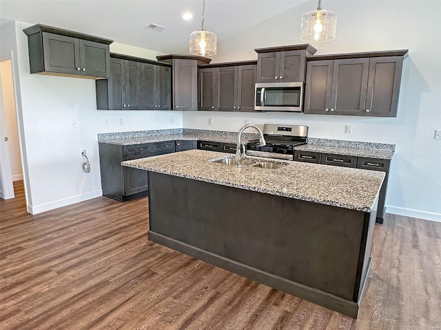 624 Rhapsody, Troy, IL 62294 - kitchen featuring stainless steel appliances, a sink, light stone counters, baseboards, and dark wood finished floors