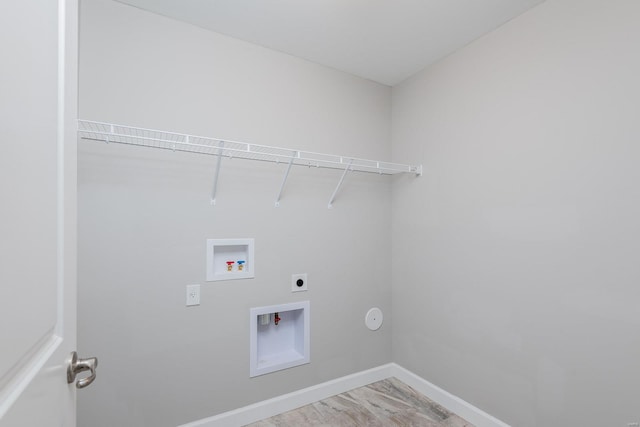 624 Rhapsody, Troy, IL 62294 - clothes washing area with hookup for an electric dryer, baseboards, and hookup for a washing machine