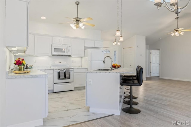 3216 E Leverett Ct, Alton, IL 62002 - kitchen featuring white appliances, a ceiling fan, a sink, white cabinetry, and light countertops