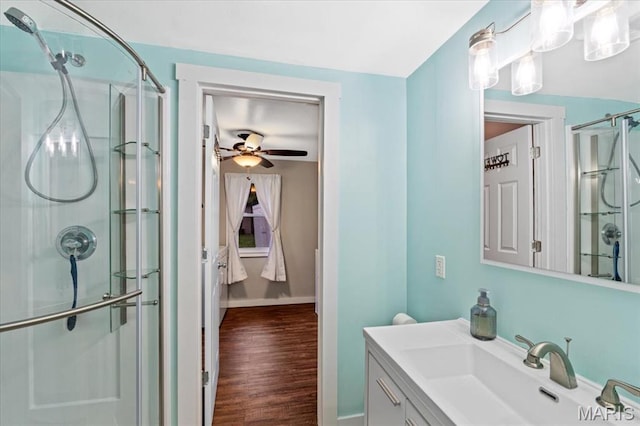 6405 S Ronnie Dr, Waterloo, IL 62298 - bathroom featuring a stall shower, vanity, a ceiling fan, and wood finished floors