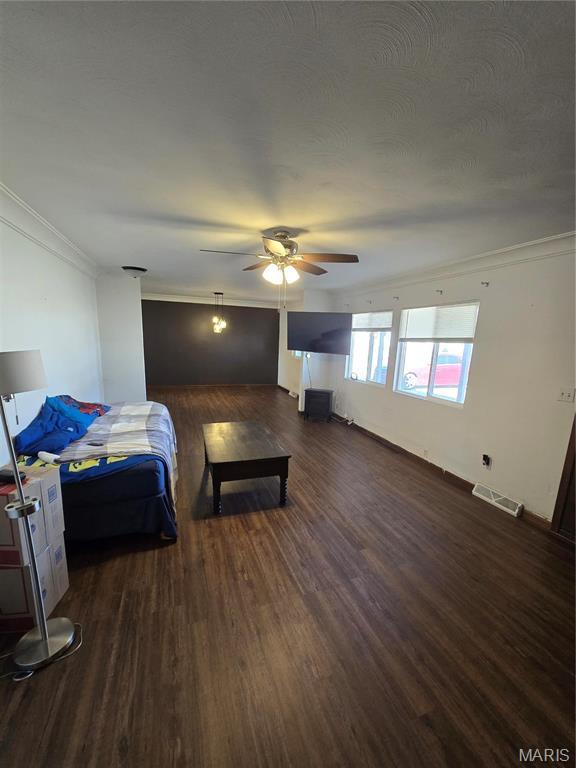 423 Virginia St, Granite City, IL 62040 - bedroom featuring crown molding, dark wood-style floors, and a ceiling fan
