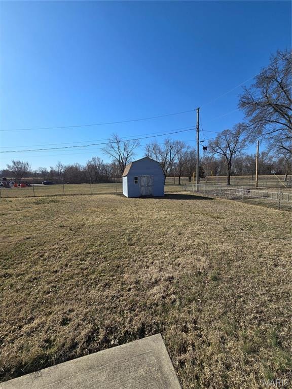 423 Virginia St, Granite City, IL 62040 - view of yard with an outdoor structure and a view of rural / pastoral area