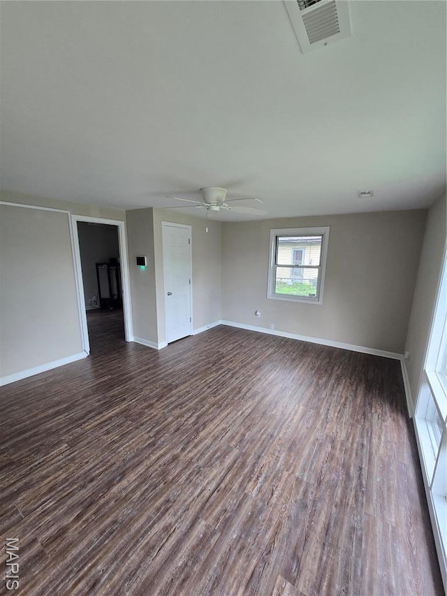 4536 Walter Ave, Granite City, IL 62040 - unfurnished room featuring dark wood-type flooring, baseboards, and a ceiling fan