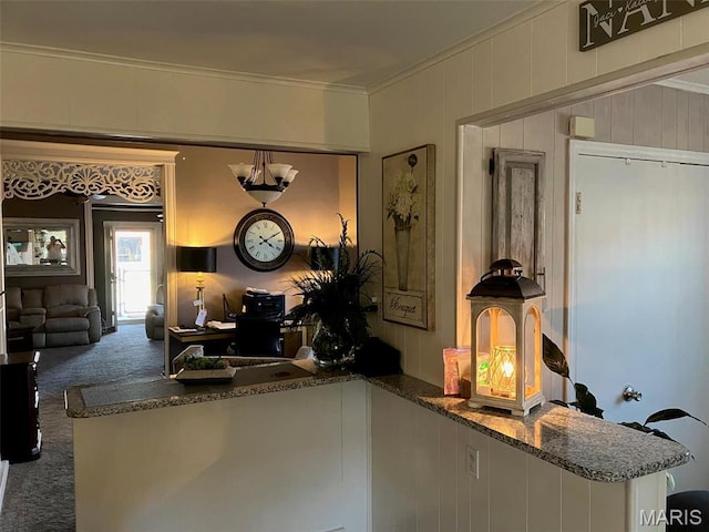 550 N 4th St, Breese, IL 62230 - kitchen with carpet flooring, crown molding, and dark stone countertops