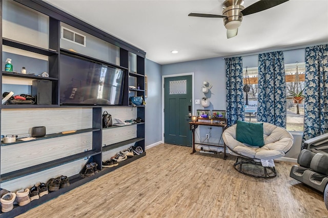 703 Locust St, Desloge, MO 63601 - living area featuring ceiling fan, baseboards, wood finished floors, and recessed lighting