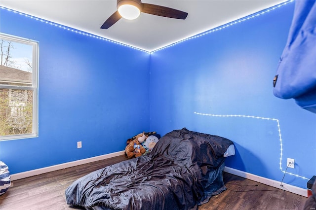 703 Locust St, Desloge, MO 63601 - bedroom with wood finished floors, baseboards, and a ceiling fan