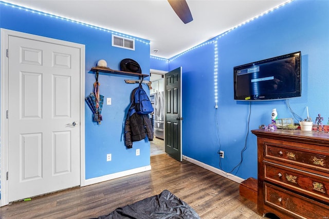 703 Locust St, Desloge, MO 63601 - bedroom with wood finished floors, baseboards, and a ceiling fan