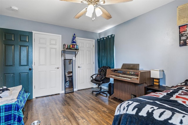 703 Locust St, Desloge, MO 63601 - bedroom with wood finished floors, a ceiling fan, and baseboards