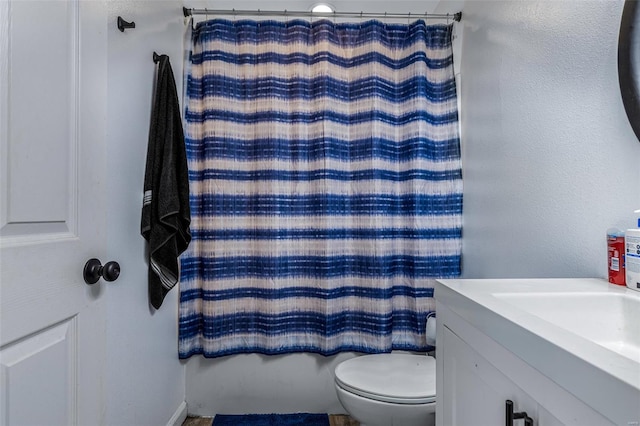 703 Locust St, Desloge, MO 63601 - bathroom with toilet, vanity, and shower / tub combo with curtain