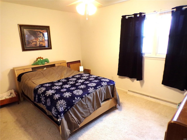 508 N Galloway Rd, Vandalia, MO 63382 - bedroom featuring baseboard heating and carpet flooring
