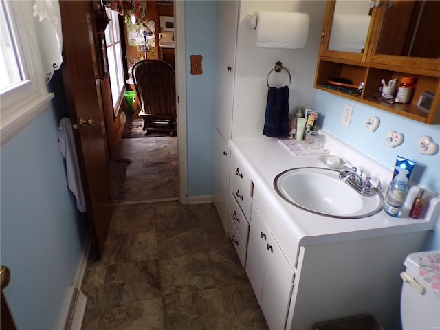 508 N Galloway Rd, Vandalia, MO 63382 - bathroom featuring vanity and baseboards