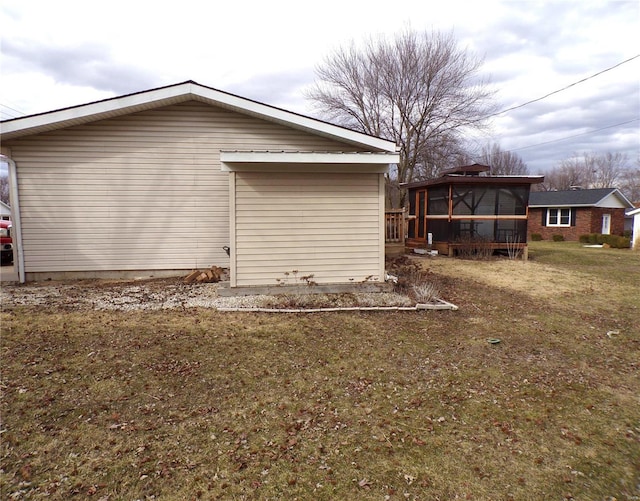 508 N Galloway Rd, Vandalia, MO 63382 - view of side of home featuring a sunroom