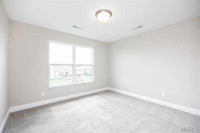 135 Reagan Dr, Troy, IL 62294 - carpeted empty room with baseboards